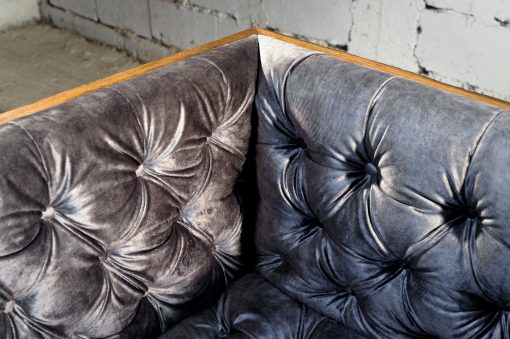Reclaimed wood- detail of velvet upholstery of armchair- styylish