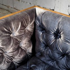 Reclaimed wood- detail of velvet upholstery of armchair- styylish