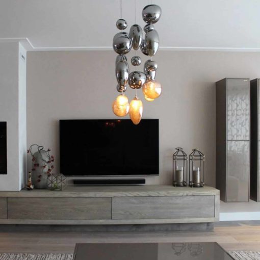 Glass pendant lights- seen in a living room- Styylish