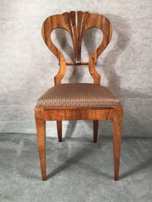 Six Biedermeier walnut chairs- one chair front view- styylish