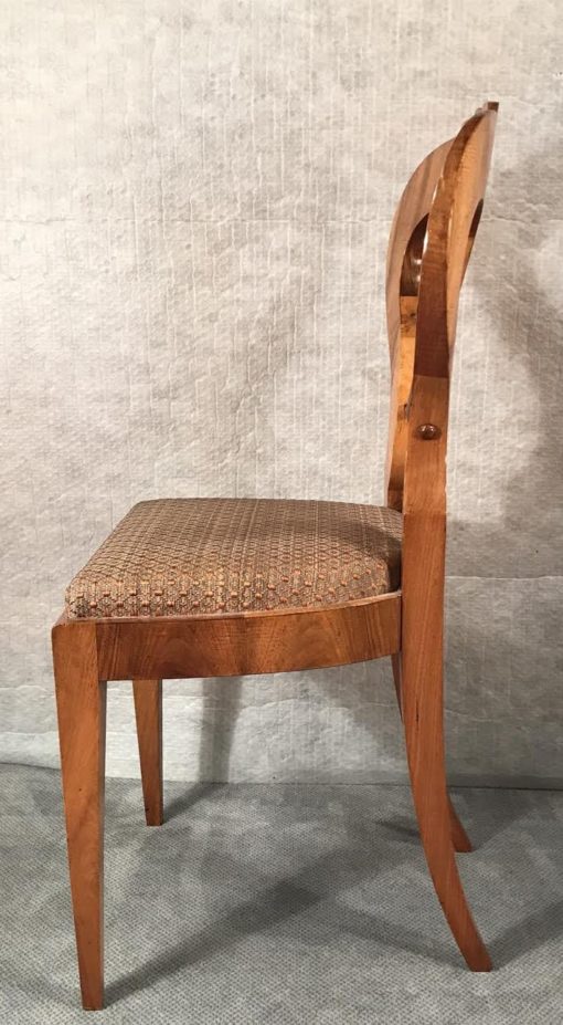 Six Biedermeier walnut chairs- one chair side view- styylish
