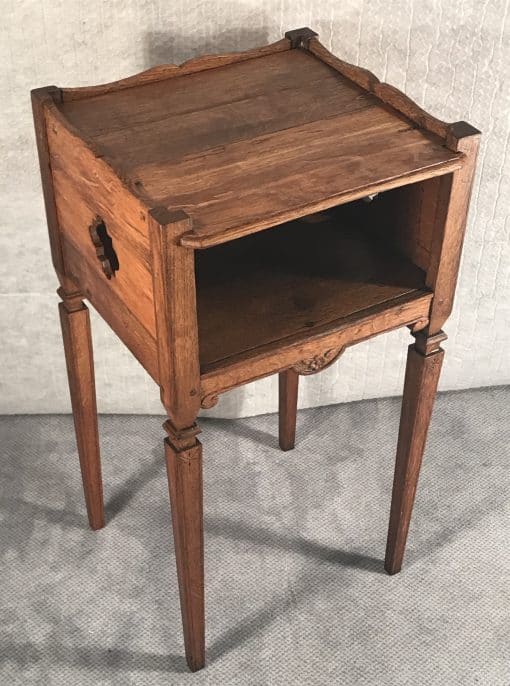 Two provincial nightstands- one of the two- three quarter view- styylish