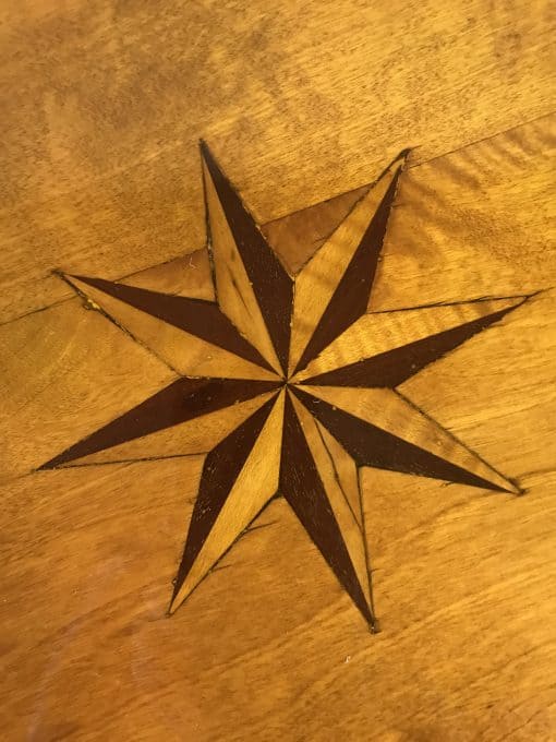 Biedermeier round side table- detail of the star intarsia on the top- Styylish