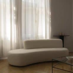 Boucle Sofa with curtains background- Styylish