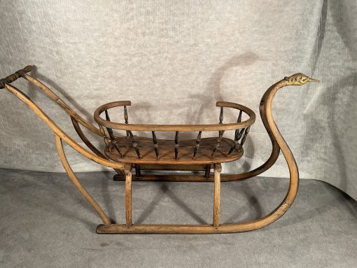 Antique sled- side view of the sled with back of the seat- Styylish