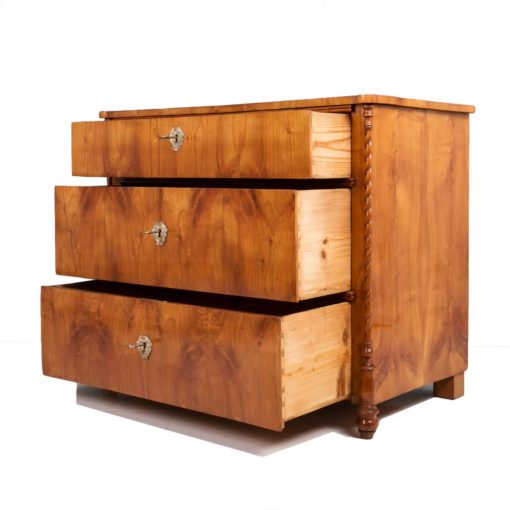 Biedermeier cherry chest of drawers- three-quarter view with open drawers- Styylish