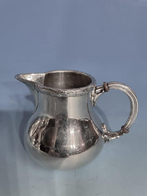 Coffee and Tea Set Silver- detail of the cream pot- Styylish