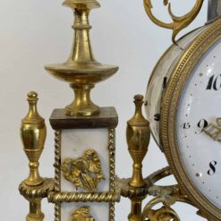 Louis XVI Mantel Clock- detail of the ormolu and marble- Styylish