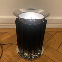 Design Lamp Taccia byt Flos- top of the base light on- Styylish