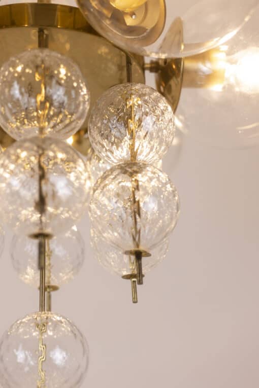 Brass and Glass Chandelier - Bulb with Lights On - Styylish