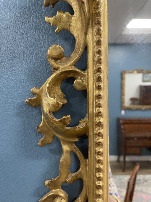 Hand-Carved Gilt Wood Mirror- detail of the left side- Styylish