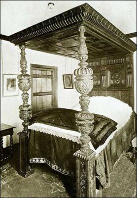 English dark wood bed