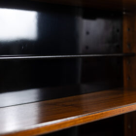 Double-sided Rosewood Bookcase on Casters. Circa 1960.