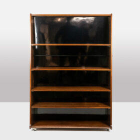 Double-sided Rosewood Bookcase on Casters. Circa 1960.