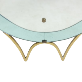 Console mirror in two-tone glass and gilded brass. Circa 1950.