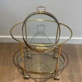 Oval neoclassical Brass Bar Cart, attributed to Maison Jansen.