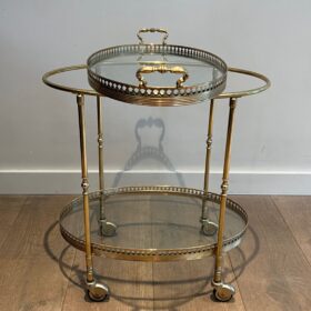 Oval neoclassical Brass Bar Cart, attributed to Maison Jansen.