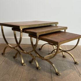 Set of Gilt Metal Nesting Tables with Claw Feet and Leather Tops Attributed by Maison Jansen