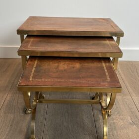 Set of Gilt Metal Nesting Tables with Claw Feet and Leather Tops Attributed by Maison Jansen