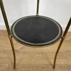 Pair of round Maison Jansen Side Tables- view of one table lower shelf- Styylish