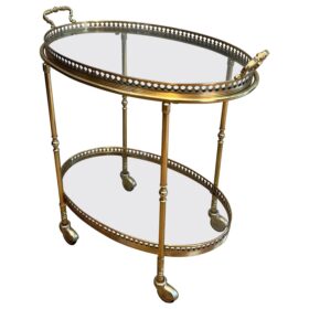 Oval neoclassical Brass Bar Cart, attributed to Maison Jansen.