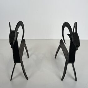 Pair of Goat Wrought Iron Andirons In the style of Edouard Schenck