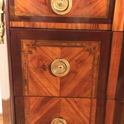 Detail of the left side of the drawers of a Louis XV-Transition chest of drawers- Styylish