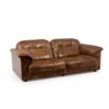 Maison De Sede two-seater sofa in gold buffalo leather, Swiss design from the 1970s with reclining seats- Styylish