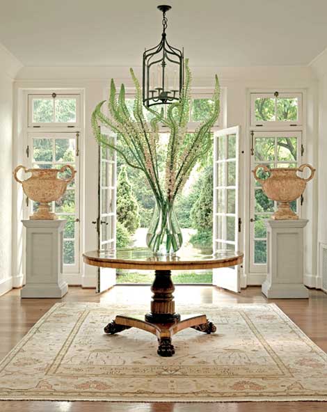 19th century antique table in spacious entryway