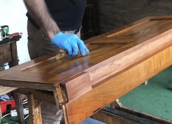 Shellac polish furniture- applying shellac with a cotton ball to an antique furniture piece- Styylish