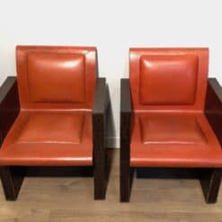 Pair of French 1970s Brown and Orange Leather Armchairs - Front View - Styylish