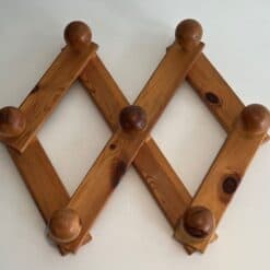 Charlotte Perriand Style Pine Accordion Coat Hanger - Front View - Styylish