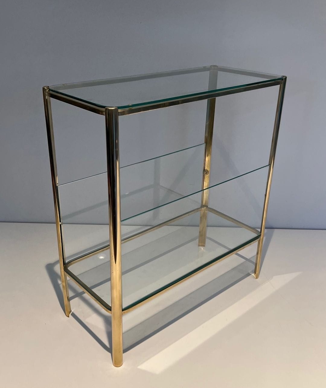 Jacques Théophile Lepelletier Bronze and Glass Magazine Rack - Angled View - Styylish