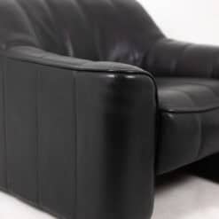 De Sede Black Leather Armchair and Ottoman - Armrest Side View - Styylish