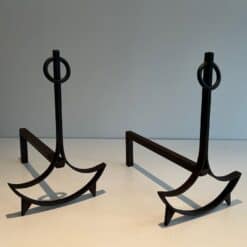 French 1940s Blackened Wrought Iron Andirons - Staggered Pair View - Styylish