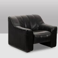 De Sede Black Leather Armchair and Ottoman - Angled View - Styylish