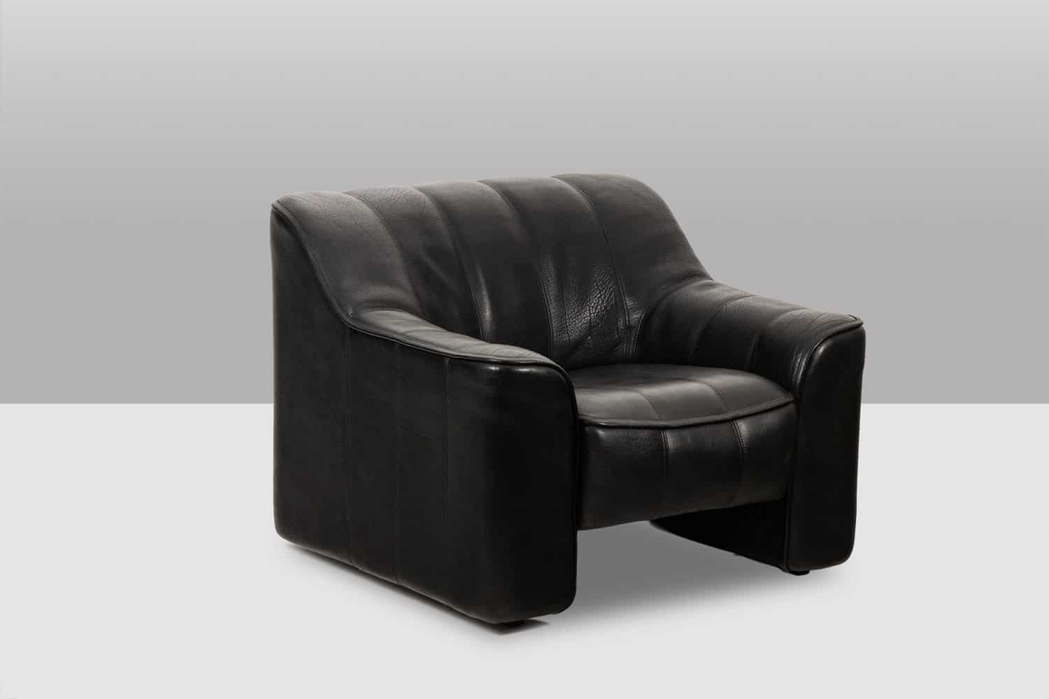De Sede Black Leather Armchair and Ottoman - Angled View - Styylish