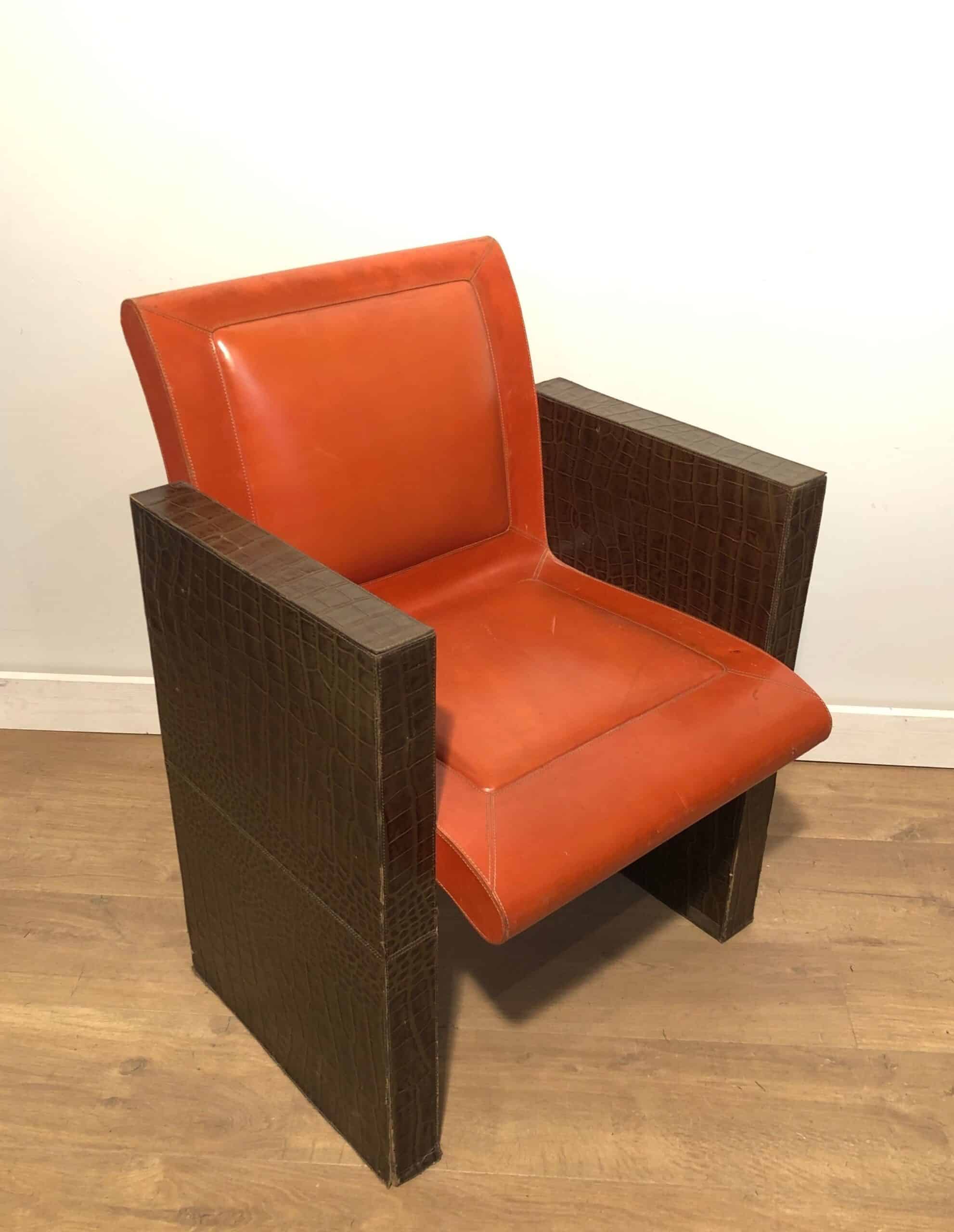 Pair of French 1970s Brown and Orange Leather Armchairs - Angled View - Styylish