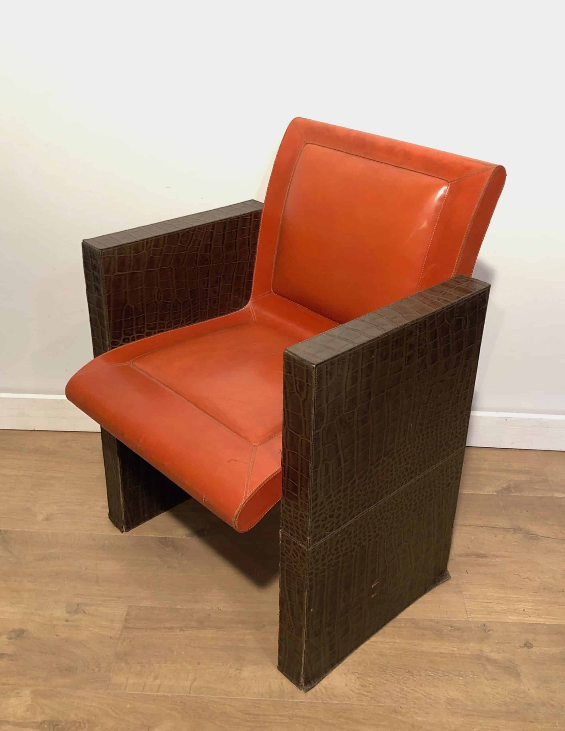 Pair of French 1970s Brown and Orange Leather Armchairs - Single Angled View - Styylish