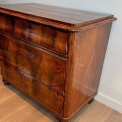French Empire Commode in Flamed Mahogany - Angled View Two - Styylish