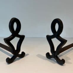 Raymond Subes Attributed Cast Iron Andirons - Angled View - Styylish