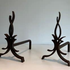 Raymond Subes Attributed Wrought Iron Andirons - Angled Front View - Styylish