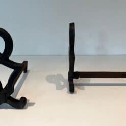 Raymond Subes Attributed Cast Iron Andirons - Front and Side View - Styylish