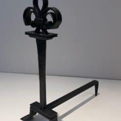 French Wrought Iron Fleur-de-Lys Andirons - Single Angled View - Styylish