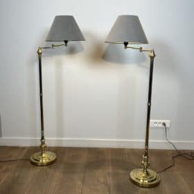 Pair of Brass Floor Reading Lamps with Articulated Arm and Grey Velvet. French Work in the Manner of Maison Jansen. Circa 1970.