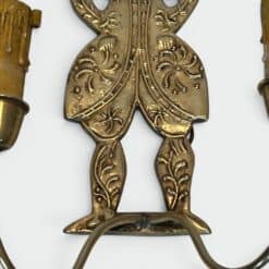 Pair of French 1950s Gilded Brass Figural Sconces - Gentleman Garments Detail - Styylish